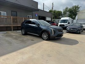 2020 CADILLAC XT4 SUV 4-CYL, TURBO, 2.0 LITER PREMIUM LUXURY SPORT UTILITY 4D at Motors On Wheels - used car dealership in Houston, Texas.