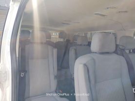 2015 FORD TRANSIT 150 WAGON PASSENGER V6, FLEX FUEL, 3.7 LITER XLT W/LOW ROOF W/60/40 SIDE DOOR VAN 3D at Motors On Wheels - used car dealership in Houston, Texas.