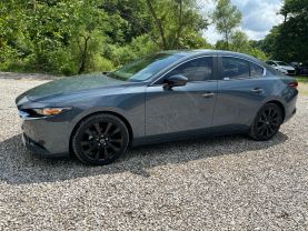 2022 MAZDA MAZDA3 SEDAN 4-CYL, SKYACTIV-G, 2.5 LITER CARBON EDITION SEDAN 4D at T&T Repairables - used car dealership in Spencer, Indiana.