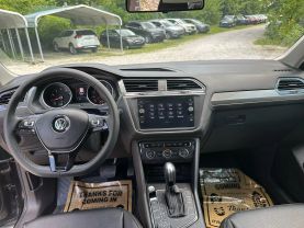 2021 VOLKSWAGEN TIGUAN SUV 4-CYL, TURBO, 2.0 LITER SE 4MOTION SPORT UTILITY 4D at T&T Repairables - used car dealership in Spencer, Indiana.