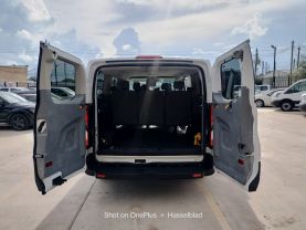 2015 FORD TRANSIT 150 WAGON PASSENGER V6, FLEX FUEL, 3.7 LITER XLT W/LOW ROOF W/60/40 SIDE DOOR VAN 3D at Motors On Wheels - used car dealership in Houston, Texas.