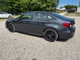 2024 HONDA CIVIC SEDAN 4-CYL, I-VTEC, 2.0 LITER SPORT SEDAN 4D at T&T Repairables - used car dealership in Spencer, Indiana.