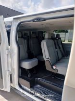 2015 FORD TRANSIT 150 WAGON PASSENGER V6, FLEX FUEL, 3.7 LITER XLT W/LOW ROOF W/60/40 SIDE DOOR VAN 3D at Motors On Wheels - used car dealership in Houston, Texas.