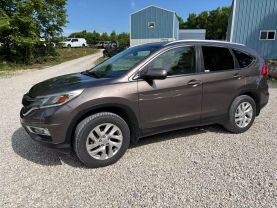 2015 HONDA CR-V SUV 4-CYL, I-VTEC, 2.4 LITER EX-L SPORT UTILITY 4D at T&T Repairables - used car dealership in Spencer, Indiana.