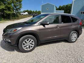 2015 HONDA CR-V SUV 4-CYL, I-VTEC, 2.4 LITER EX-L SPORT UTILITY 4D at T&T Repairables - used car dealership in Spencer, Indiana.