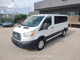 2015 FORD TRANSIT 150 WAGON PASSENGER V6, FLEX FUEL, 3.7 LITER XLT W/LOW ROOF W/60/40 SIDE DOOR VAN 3D at Motors On Wheels - used car dealership in Houston, Texas.