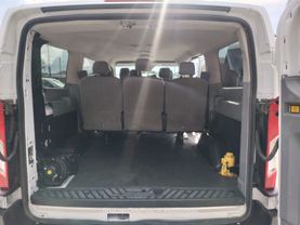 2015 FORD TRANSIT 150 WAGON PASSENGER V6, FLEX FUEL, 3.7 LITER XLT W/LOW ROOF W/60/40 SIDE DOOR VAN 3D at Motors On Wheels - used car dealership in Houston, Texas.