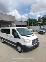 2015 FORD TRANSIT 150 WAGON PASSENGER V6, FLEX FUEL, 3.7 LITER XLT W/LOW ROOF W/60/40 SIDE DOOR VAN 3D at Motors On Wheels - used car dealership in Houston, Texas.