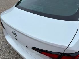 2025 NISSAN VERSA SEDAN 4-CYL, 1.6 LITER SV SEDAN 4D at T&T Repairables - used car dealership in Spencer, Indiana.