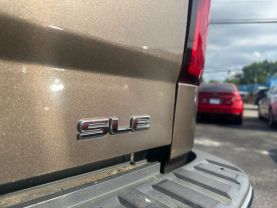 Used 2015 GMC SIERRA 1500 DOUBLE CAB PICKUP V6, ECOTEC3, 4.3L FF SLE PICKUP 4D 6 1/2 FT - LA Auto Star located in Virginia Beach, VA