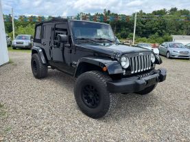 2016 JEEP WRANGLER SUV V6, 3.6 LITER UNLIMITED SAHARA SPORT UTILITY 4D