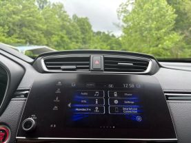 2022 HONDA CR-V SUV 4-CYL, TURBO, 1.5 LITER EX-L SPORT UTILITY 4D at T&T Repairables - used car dealership in Spencer, Indiana.