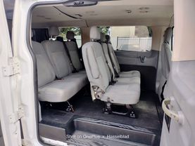 2015 FORD TRANSIT 150 WAGON PASSENGER V6, FLEX FUEL, 3.7 LITER XLT W/LOW ROOF W/60/40 SIDE DOOR VAN 3D at Motors On Wheels - used car dealership in Houston, Texas.