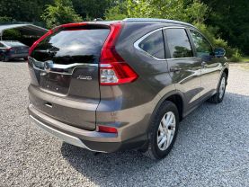 2015 HONDA CR-V SUV 4-CYL, I-VTEC, 2.4 LITER EX-L SPORT UTILITY 4D at T&T Repairables - used car dealership in Spencer, Indiana.