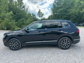 2021 VOLKSWAGEN TIGUAN SUV 4-CYL, TURBO, 2.0 LITER SE 4MOTION SPORT UTILITY 4D at T&T Repairables - used car dealership in Spencer, Indiana.