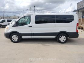 2015 FORD TRANSIT 150 WAGON PASSENGER V6, FLEX FUEL, 3.7 LITER XLT W/LOW ROOF W/60/40 SIDE DOOR VAN 3D at Motors On Wheels - used car dealership in Houston, Texas.
