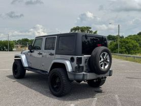 2016 JEEP WRANGLER SUV V6, 3.6 LITER UNLIMITED SAHARA SPORT UTILITY 4D