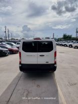 2015 FORD TRANSIT 150 WAGON PASSENGER V6, FLEX FUEL, 3.7 LITER XLT W/LOW ROOF W/60/40 SIDE DOOR VAN 3D at Motors On Wheels - used car dealership in Houston, Texas.