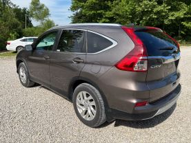 2015 HONDA CR-V SUV 4-CYL, I-VTEC, 2.4 LITER EX-L SPORT UTILITY 4D at T&T Repairables - used car dealership in Spencer, Indiana.