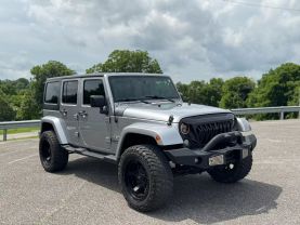 2016 JEEP WRANGLER SUV V6, 3.6 LITER UNLIMITED SAHARA SPORT UTILITY 4D