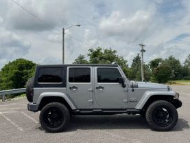 2016 JEEP WRANGLER SUV V6, 3.6 LITER UNLIMITED SAHARA SPORT UTILITY 4D