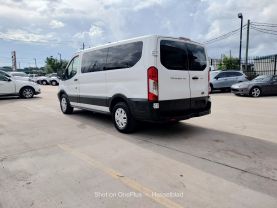 2015 FORD TRANSIT 150 WAGON PASSENGER V6, FLEX FUEL, 3.7 LITER XLT W/LOW ROOF W/60/40 SIDE DOOR VAN 3D at Motors On Wheels - used car dealership in Houston, Texas.