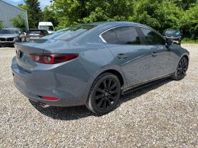 2022 MAZDA MAZDA3 SEDAN 4-CYL, SKYACTIV-G, 2.5 LITER CARBON EDITION SEDAN 4D at T&T Repairables - used car dealership in Spencer, Indiana.