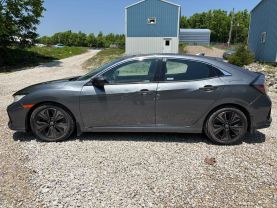 2019 HONDA CIVIC HATCHBACK 4-CYL, PZEV, TURBO, 1.5 LITER EX HATCHBACK 4D at T&T Repairables - used car dealership in Spencer, Indiana.