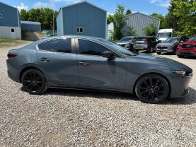 2022 MAZDA MAZDA3 SEDAN 4-CYL, SKYACTIV-G, 2.5 LITER CARBON EDITION SEDAN 4D at T&T Repairables - used car dealership in Spencer, Indiana.