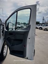 2015 FORD TRANSIT 150 WAGON PASSENGER V6, FLEX FUEL, 3.7 LITER XLT W/LOW ROOF W/60/40 SIDE DOOR VAN 3D at Motors On Wheels - used car dealership in Houston, Texas.