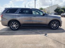 2014 DODGE DURANGO SUV V6, FLEX FUEL, 3.6 LITER SXT SPORT UTILITY 4D at Motors On Wheels - used car dealership in Houston, Texas.
