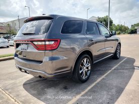 2014 DODGE DURANGO SUV V6, FLEX FUEL, 3.6 LITER SXT SPORT UTILITY 4D at Motors On Wheels - used car dealership in Houston, Texas.