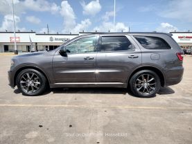 2014 DODGE DURANGO SUV V6, FLEX FUEL, 3.6 LITER SXT SPORT UTILITY 4D at Motors On Wheels - used car dealership in Houston, Texas.