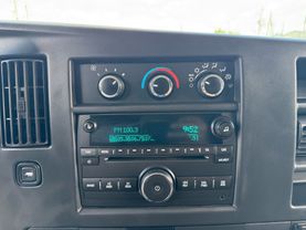 2018 CHEVROLET EXPRESS 3500 PASSENGER PASSENGER V8, FLEX FUEL, 6.0 LITER LS EXTENDED VAN 3D at Motors On Wheels - used car dealership in Houston, Texas.
