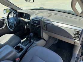 2004 JEEP GRAND CHEROKEE SUV 6-CYL, 4.0 LITER LAREDO SPORT UTILITY 4D