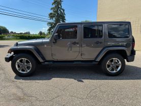 2016 JEEP WRANGLER SUV V6, 3.6 LITER UNLIMITED SAHARA SPORT UTILITY 4D