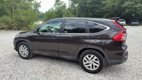 2016 HONDA CR-V SUV 4-CYL, I-VTEC, 2.4 LITER EX SPORT UTILITY 4D at T&T Repairables - used car dealership in Spencer, Indiana.
