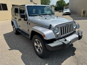2016 JEEP WRANGLER SUV V6, 3.6 LITER UNLIMITED SAHARA SPORT UTILITY 4D