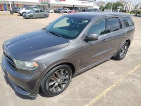 2014 DODGE DURANGO SUV V6, FLEX FUEL, 3.6 LITER SXT SPORT UTILITY 4D at Motors On Wheels - used car dealership in Houston, Texas.