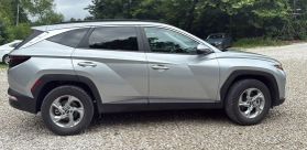 2023 HYUNDAI TUCSON SUV 4-CYL, GDI, 2.5 LITER SEL SPORT UTILITY 4D at T&T Repairables - used car dealership in Spencer, Indiana.