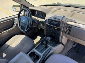 2004 JEEP GRAND CHEROKEE SUV 6-CYL, 4.0 LITER LAREDO SPORT UTILITY 4D