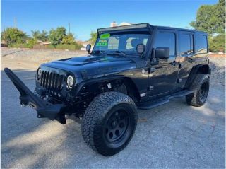 2013 JEEP WRANGLER UNLIMITED SAHARA MOAB SPORT UTILITY 4D