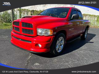 2004 DODGE RAM 1500 QUAD CAB PICKUP FLAME RED AUTOMATIC - Jim Butner Auto in Clarksville, IN 38.30782262290089, -85.77529235397657