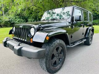 Image of 2011 JEEP WRANGLER UNLIMITED SAHARA SPORT UTILITY 4D