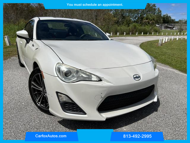 2014 SCION FR-S COUPE 4-CYL, 2.0 LITER COUPE 2D at Carfox Auto Sales in Tampa, FL. 28.071273613212345, -82.44776520995791