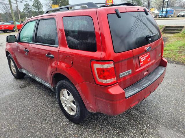 2010 FORD ESCAPE SUV V6, FLEX FUEL, 3.0 LITER XLT SPORT UTILITY 4D at Automotive Experts in West Columbia, SC  33.97881747205648, -81.11878200237658