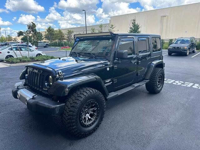 2011 Jeep Wrangler Unlimited Sahara photo 1