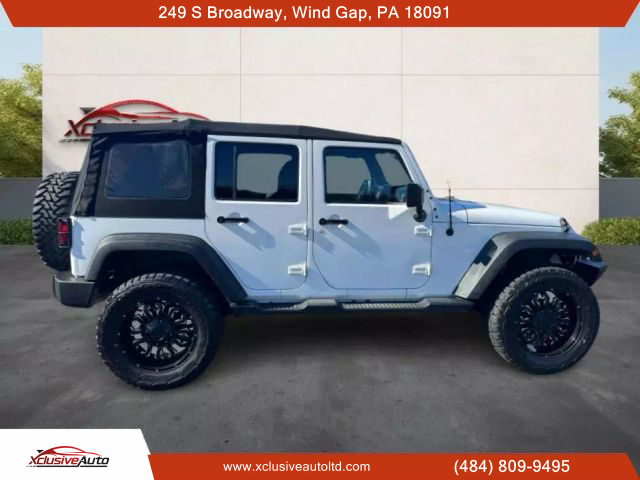 2016 JEEP WRANGLER SUV V6, 3.6 LITER UNLIMITED SPORT SUV 4D - Xclusive Auto Ltd