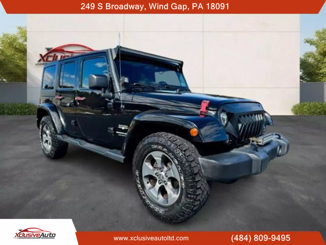 2018 JEEP WRANGLER UNLIMITED SUV V6, 3.6 LITER SAHARA (JK) SPORT UTILITY 4D - Xclusive Auto Ltd