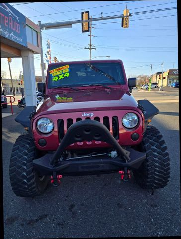 2013 Jeep Wrangler Unlimited Sahara Sport Utility 4d - Image 3